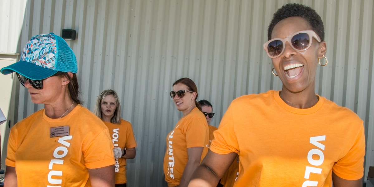 volunteers laughing 