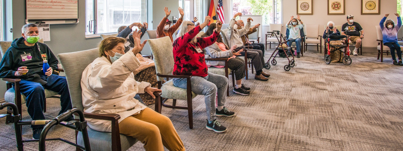 aging adults doing light exercise 