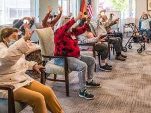 aging adults doing light exercise 
